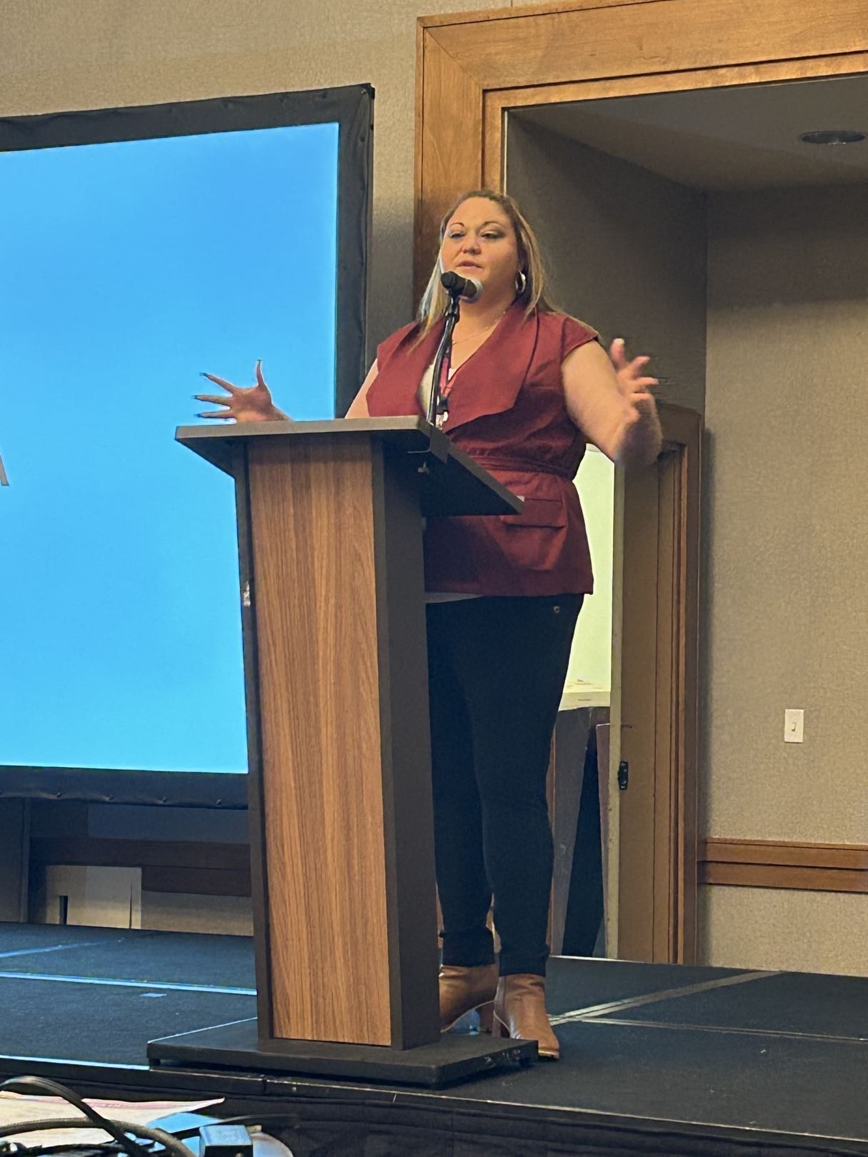 Victoria Doyle speaking at an event